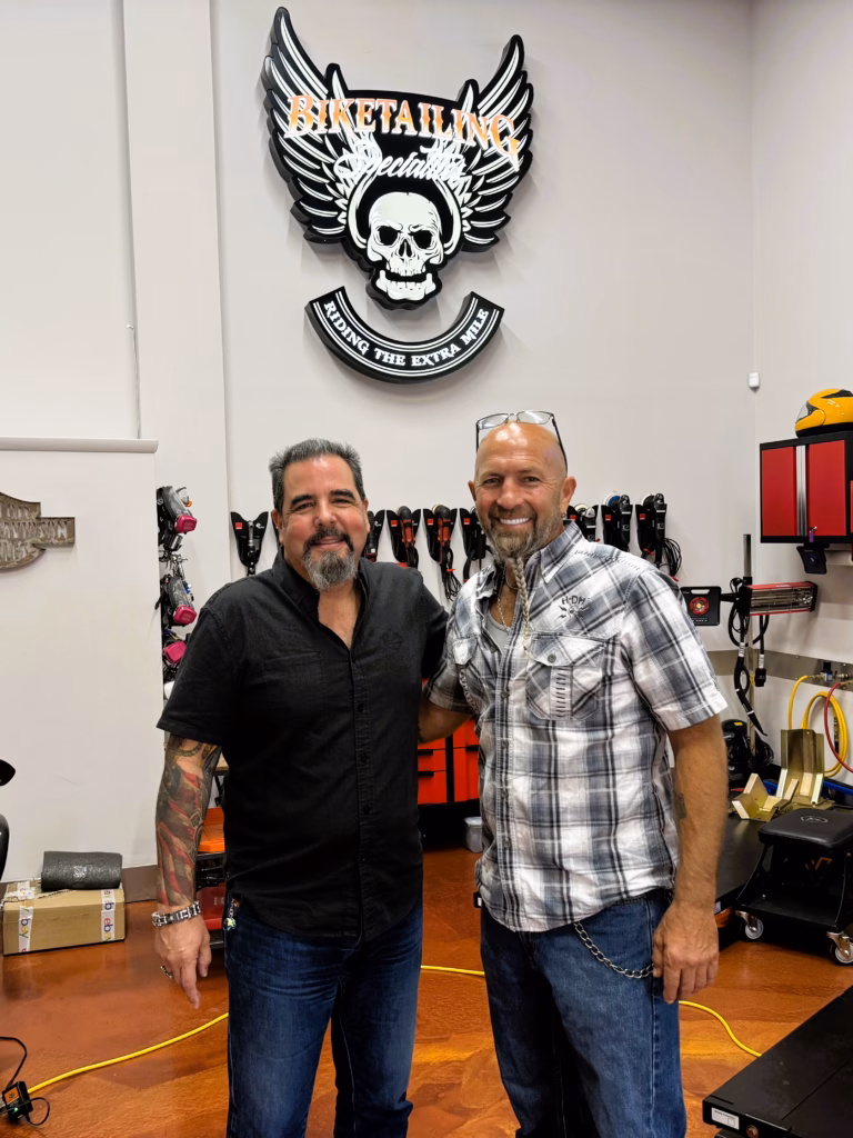 Hurshell Morrison, new owner of Biketailing Specialties, pictured with Founder Roman Jimenez, at our Miami motorcycle detailing, restoration, preservation, customization studio and shop, Miami, FL.